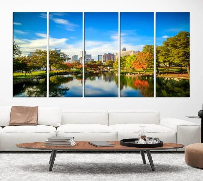 The Charlotte City Park at Spring Skyline Cityscape View Wall Art Canvas Print features a triptych of a city park scene with a calm lake, colorful autumn trees, and skyline. Crafted on museum-quality canvas and hand-assembled with a frame, this artwork is ready to hang and ideal for bringing elegance and serenity to your living space.