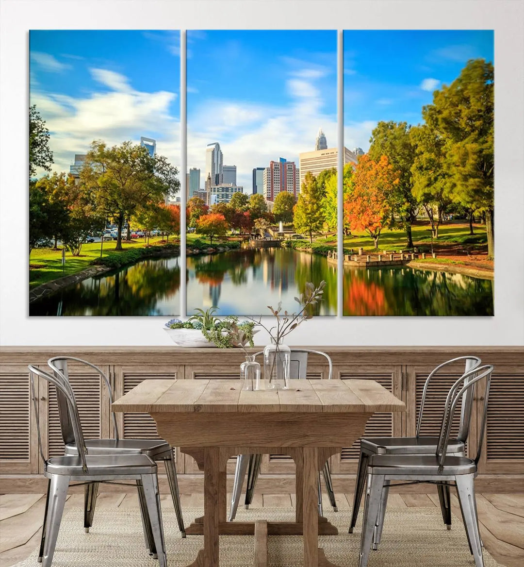 The Charlotte City Park at Spring Skyline Cityscape View wall art canvas print is a triptych featuring a scenic park with a lake and city skyline. It is gallery-wrapped on museum-quality canvases.