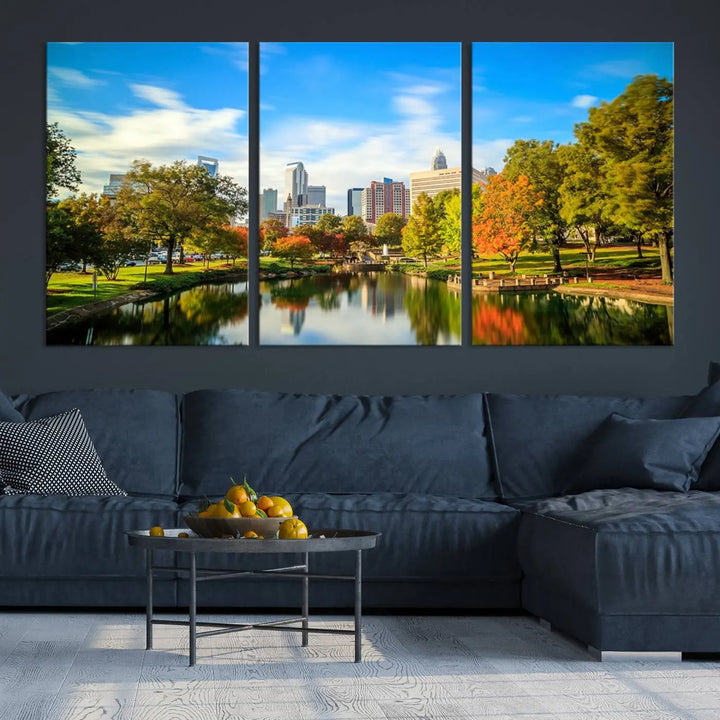 The Charlotte City Park at Spring Skyline Cityscape View wall art canvas print is a triptych featuring a scenic park with a lake and city skyline. It is gallery-wrapped on museum-quality canvases.