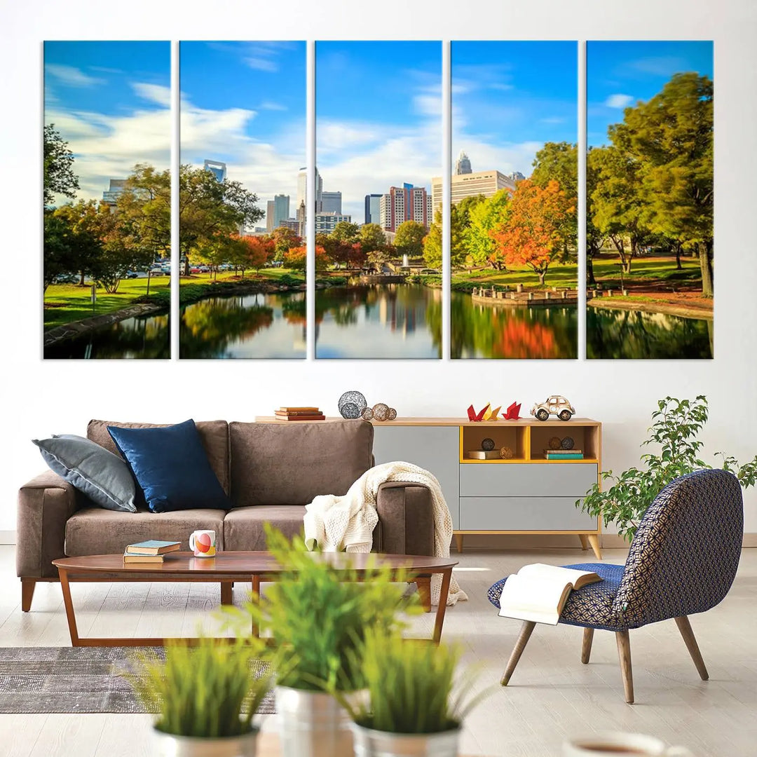 The Charlotte City Park at Spring Skyline Cityscape View wall art canvas print is a triptych featuring a scenic park with a lake and city skyline. It is gallery-wrapped on museum-quality canvases.