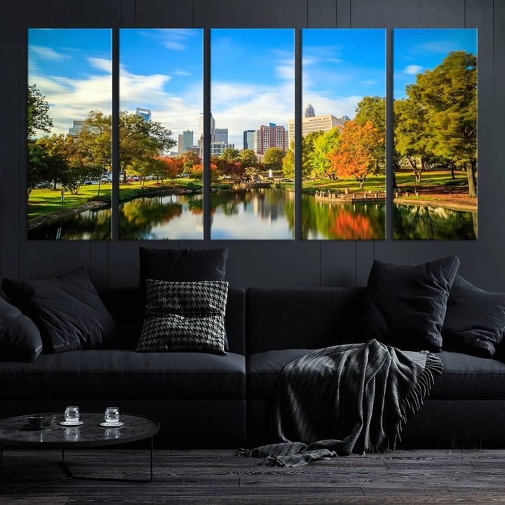 The Charlotte City Park at Spring Skyline Cityscape View wall art canvas print is a triptych featuring a scenic park with a lake and city skyline. It is gallery-wrapped on museum-quality canvases.