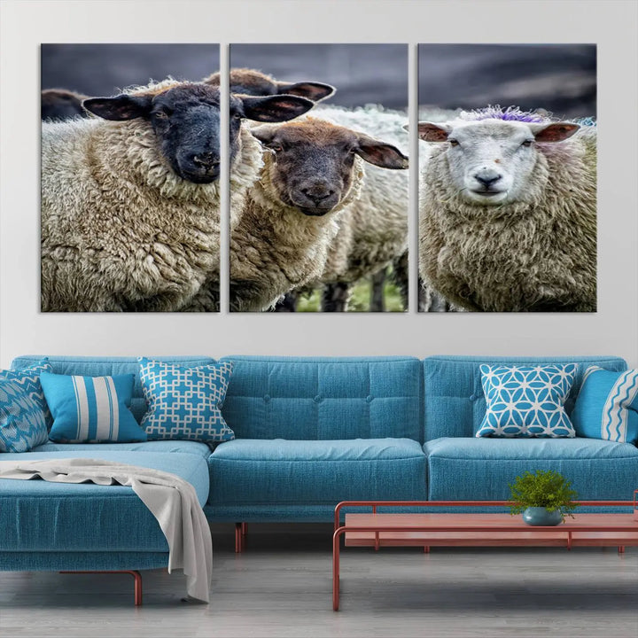 The Charming Sheep Portrait Wall Art, featuring a trio of woolly companions on a canvas print, framed and ready to hang, adds charm to your living space with its perfect farmhouse-style décor.