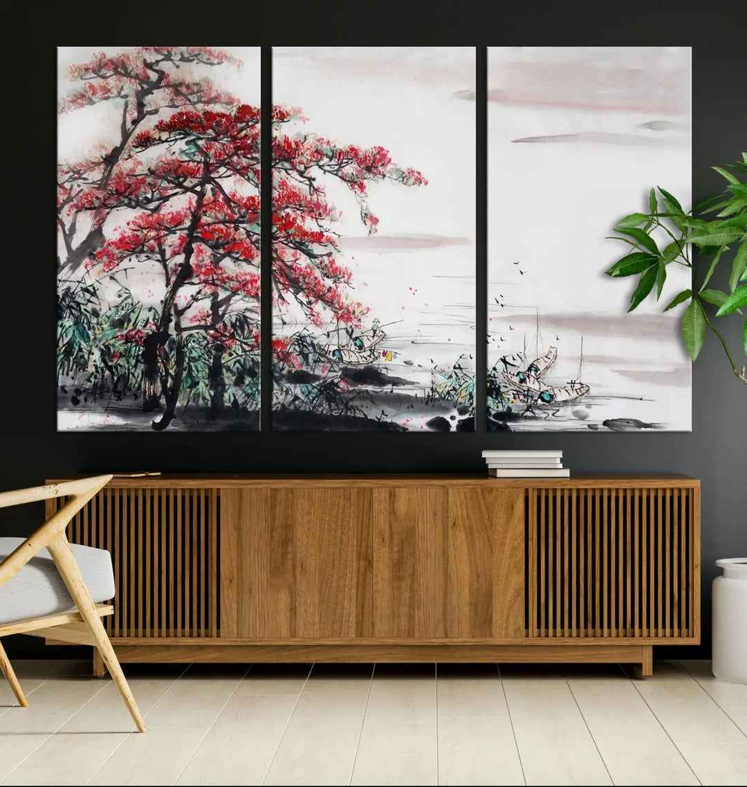 The Cherry Blossom Art Painting Canvas Wall Art, depicting a red tree and abstract landscape on museum-quality canvases, adorns the gray wall. These gallery-wrapped pieces are enhanced with UV-protective coating to preserve their vivid allure.