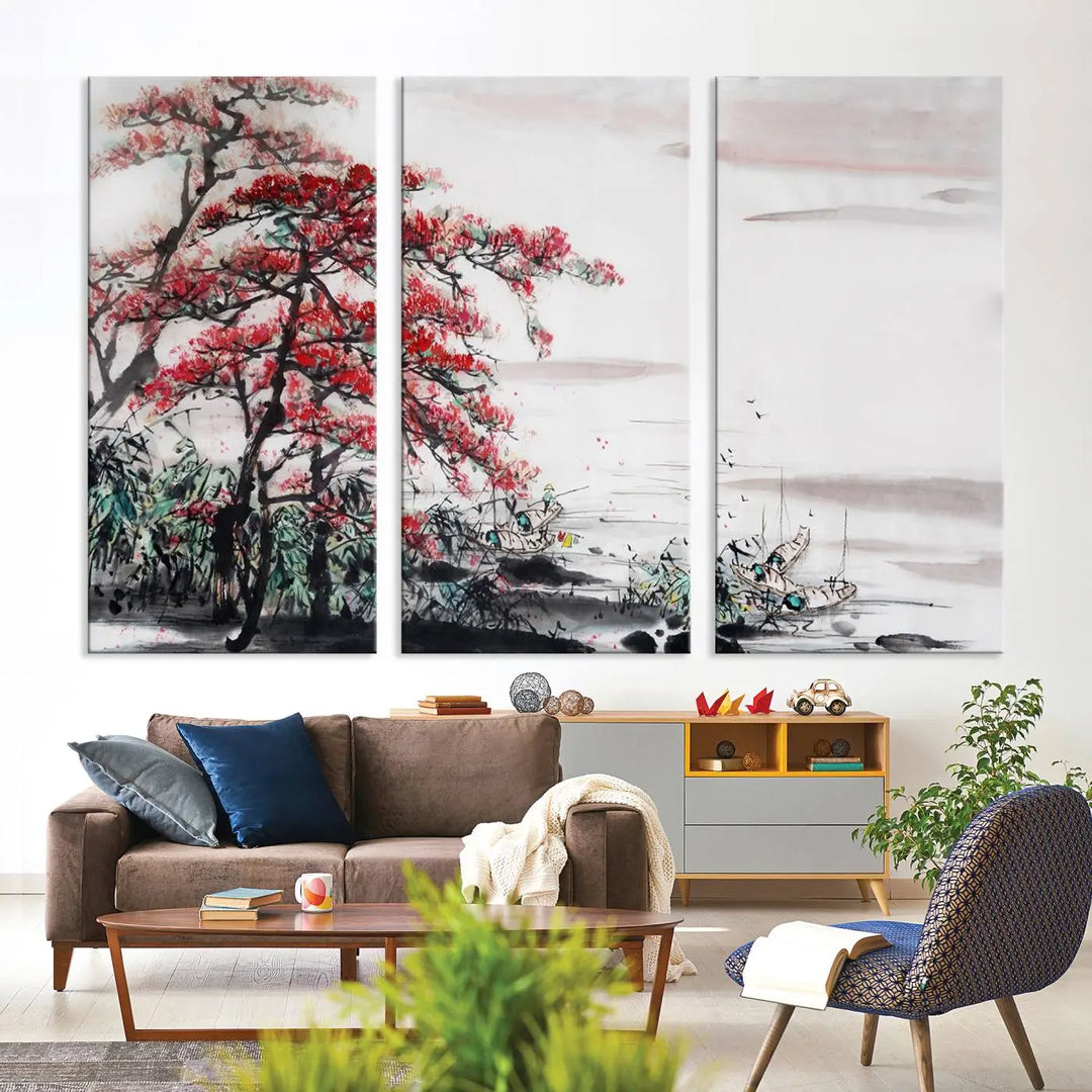 The Cherry Blossom Art Painting Canvas Wall Art, depicting a red tree and abstract landscape on museum-quality canvases, adorns the gray wall. These gallery-wrapped pieces are enhanced with UV-protective coating to preserve their vivid allure.