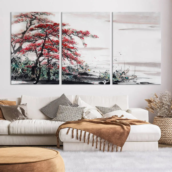 The Cherry Blossom Art Painting Canvas Wall Art, depicting a red tree and abstract landscape on museum-quality canvases, adorns the gray wall. These gallery-wrapped pieces are enhanced with UV-protective coating to preserve their vivid allure.