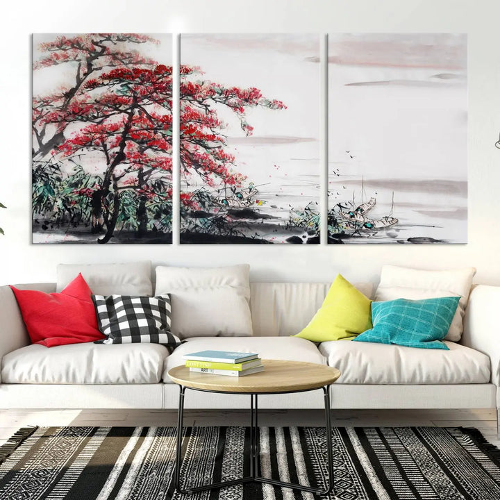 The Cherry Blossom Art Painting Canvas Wall Art, depicting a red tree and abstract landscape on museum-quality canvases, adorns the gray wall. These gallery-wrapped pieces are enhanced with UV-protective coating to preserve their vivid allure.