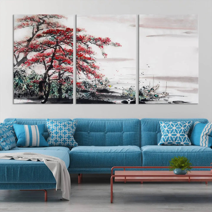 The Cherry Blossom Art Painting Canvas Wall Art, depicting a red tree and abstract landscape on museum-quality canvases, adorns the gray wall. These gallery-wrapped pieces are enhanced with UV-protective coating to preserve their vivid allure.