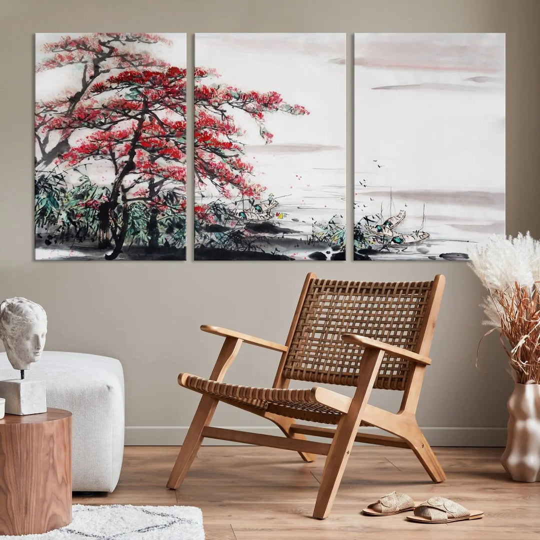 The Cherry Blossom Art Painting Canvas Wall Art, depicting a red tree and abstract landscape on museum-quality canvases, adorns the gray wall. These gallery-wrapped pieces are enhanced with UV-protective coating to preserve their vivid allure.