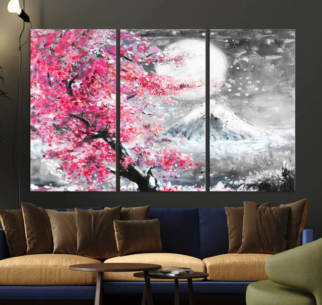 The living room features a striking gallery-wrapped canvas with UV-protective coating, showcasing the "Cherry Blossom Painting Canvas Wall Art Full Moon Art Winter Canvas Art," which depicts a cherry blossom tree with a mountain backdrop.