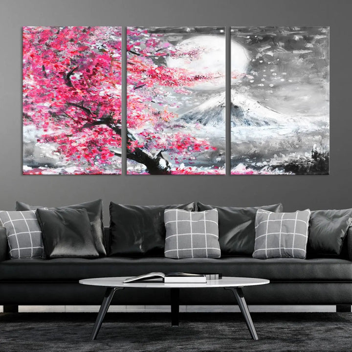 The living room features a striking gallery-wrapped canvas with UV-protective coating, showcasing the "Cherry Blossom Painting Canvas Wall Art Full Moon Art Winter Canvas Art," which depicts a cherry blossom tree with a mountain backdrop.