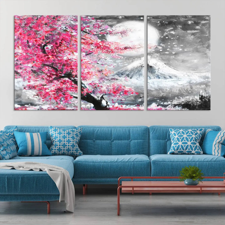 The living room features a striking gallery-wrapped canvas with UV-protective coating, showcasing the "Cherry Blossom Painting Canvas Wall Art Full Moon Art Winter Canvas Art," which depicts a cherry blossom tree with a mountain backdrop.