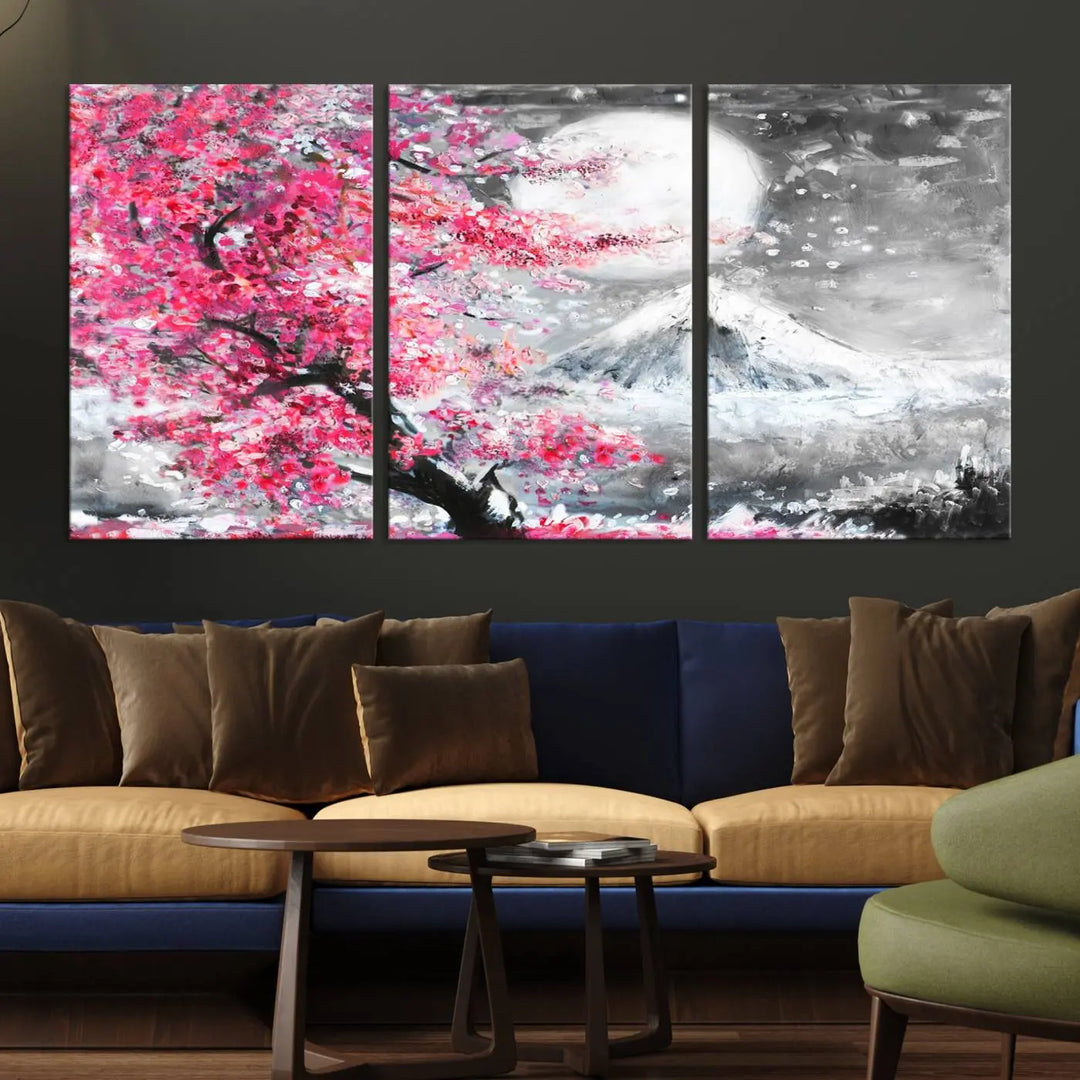 The living room features a striking gallery-wrapped canvas with UV-protective coating, showcasing the "Cherry Blossom Painting Canvas Wall Art Full Moon Art Winter Canvas Art," which depicts a cherry blossom tree with a mountain backdrop.