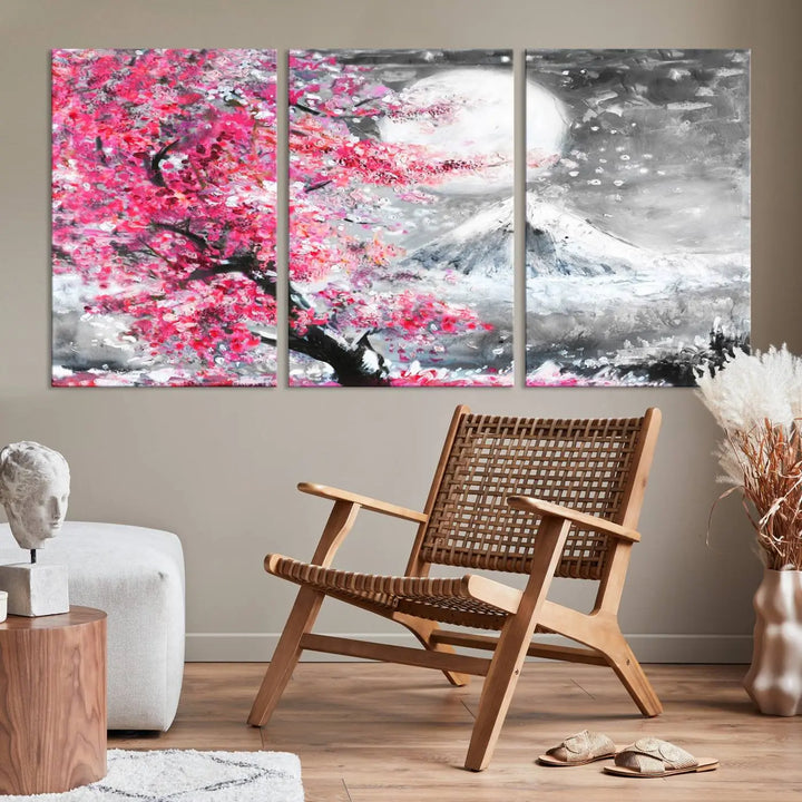 The living room features a striking gallery-wrapped canvas with UV-protective coating, showcasing the "Cherry Blossom Painting Canvas Wall Art Full Moon Art Winter Canvas Art," which depicts a cherry blossom tree with a mountain backdrop.