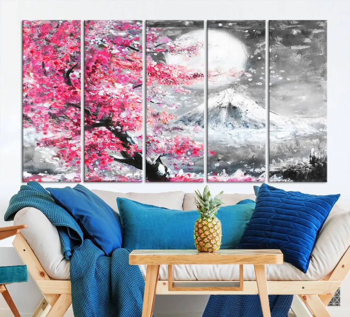 The living room features a striking gallery-wrapped canvas with UV-protective coating, showcasing the "Cherry Blossom Painting Canvas Wall Art Full Moon Art Winter Canvas Art," which depicts a cherry blossom tree with a mountain backdrop.