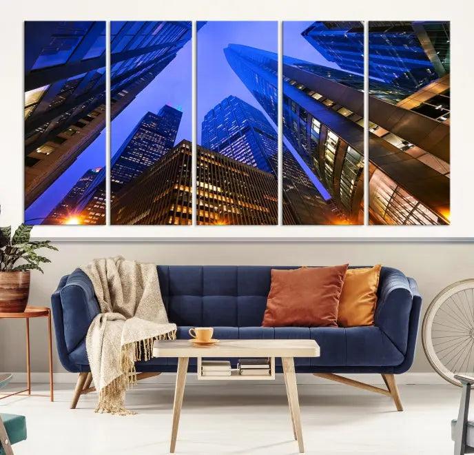 The Chicago Wall Art Canvas Print showcases the cityscape with a breathtaking view from below, featuring skyscrapers illuminated with blue lighting at night. Printed on museum-quality canvas, it arrives ready to hang, adding both style and convenience to your space.