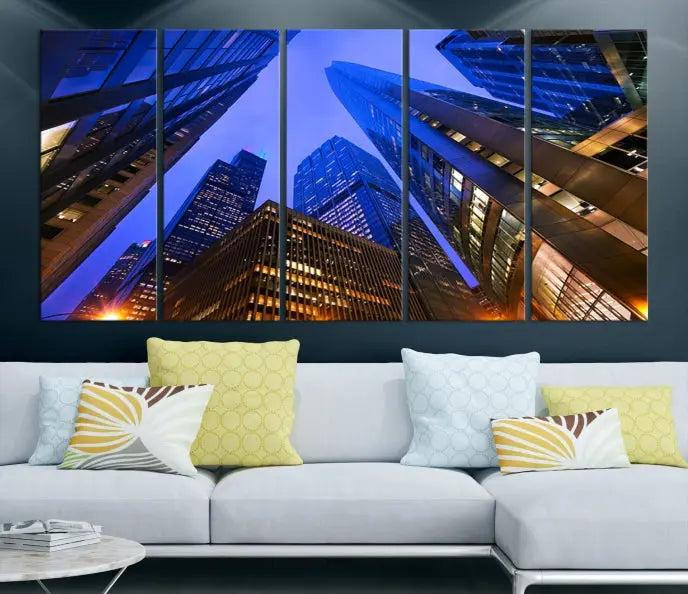 The Chicago Wall Art Canvas Print showcases the cityscape with a breathtaking view from below, featuring skyscrapers illuminated with blue lighting at night. Printed on museum-quality canvas, it arrives ready to hang, adding both style and convenience to your space.