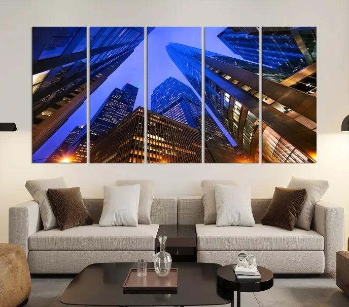 The Chicago Wall Art Canvas Print showcases the cityscape with a breathtaking view from below, featuring skyscrapers illuminated with blue lighting at night. Printed on museum-quality canvas, it arrives ready to hang, adding both style and convenience to your space.