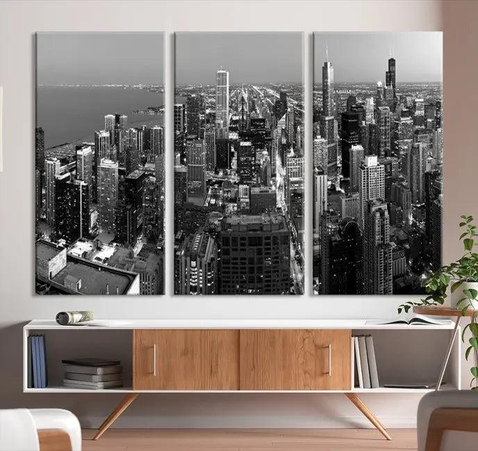 A set of Chicago Wall Art Canvas Print panels, depicting the city skyline at night in black and white, is crafted on museum-quality canvases with a satin varnish for an elegant finish.