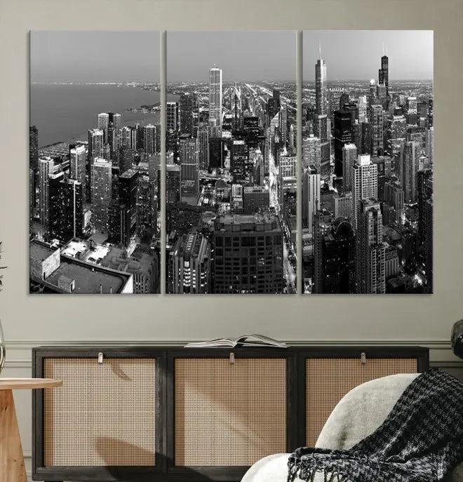 A set of Chicago Wall Art Canvas Print panels, depicting the city skyline at night in black and white, is crafted on museum-quality canvases with a satin varnish for an elegant finish.