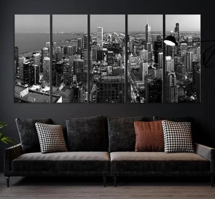 A set of Chicago Wall Art Canvas Print panels, depicting the city skyline at night in black and white, is crafted on museum-quality canvases with a satin varnish for an elegant finish.