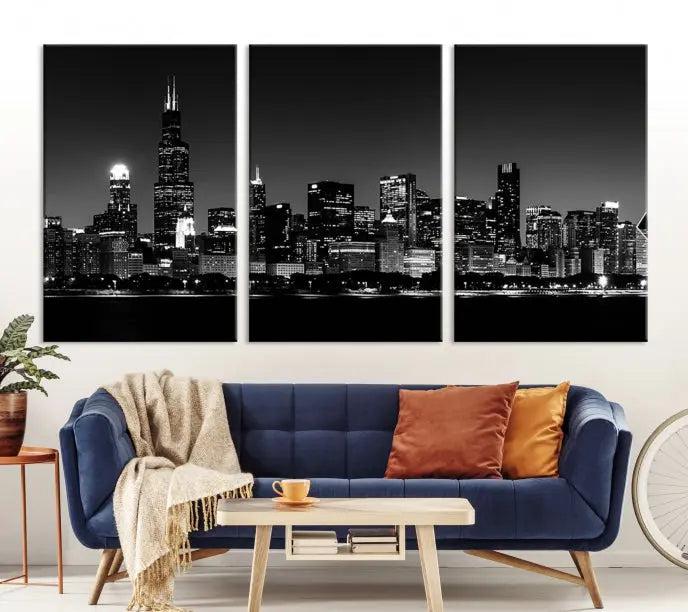 Elegantly displayed above the modern living room, a black and white cityscape stretches across three panels. This premium Chicago Wall Art Canvas Print captures the city's skyline at night, crafted with museum-quality canvas and enhanced by a UV-protective coating to maintain its vibrant appearance. It arrives ready to hang for seamless installation.