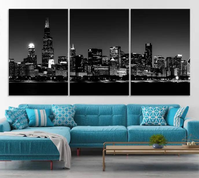 Elegantly displayed above the modern living room, a black and white cityscape stretches across three panels. This premium Chicago Wall Art Canvas Print captures the city's skyline at night, crafted with museum-quality canvas and enhanced by a UV-protective coating to maintain its vibrant appearance. It arrives ready to hang for seamless installation.