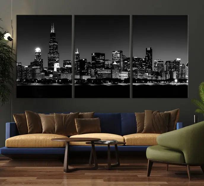 Elegantly displayed above the modern living room, a black and white cityscape stretches across three panels. This premium Chicago Wall Art Canvas Print captures the city's skyline at night, crafted with museum-quality canvas and enhanced by a UV-protective coating to maintain its vibrant appearance. It arrives ready to hang for seamless installation.