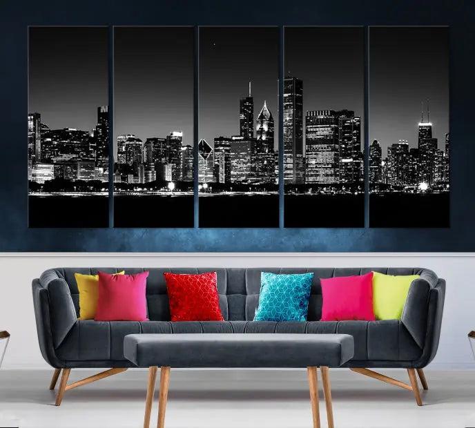 A Chicago Wall Art Canvas Print, featuring a stunning black and white panorama of the city's skyline at night, is printed on gallery wrapped, museum-quality canvas with a UV-protective coating.