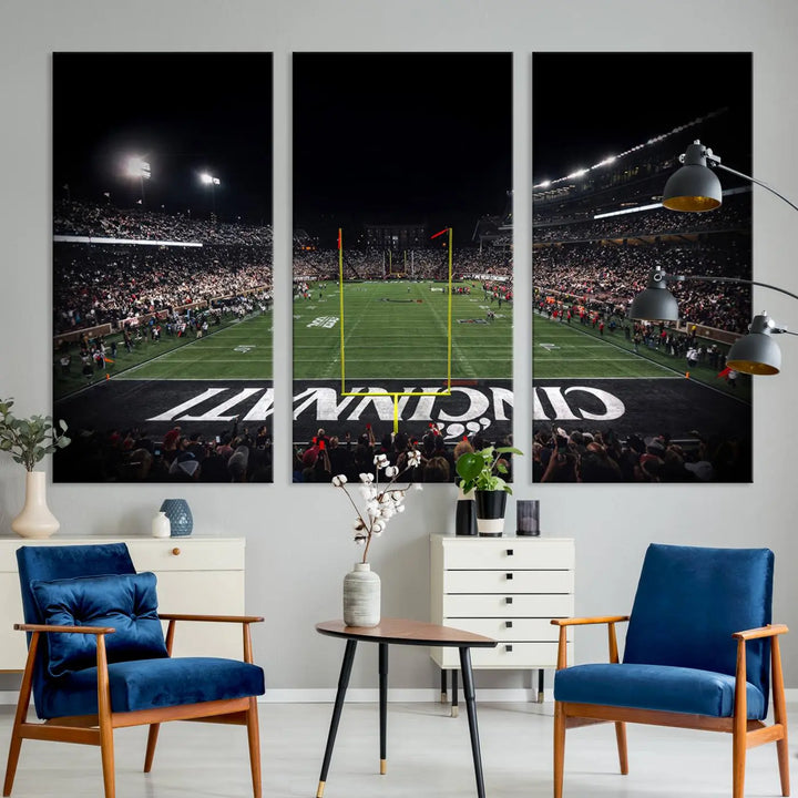 The Cincinnati Bearcats Football Team Print - Nippert Stadium Wall Art Canvas captures a panoramic view of the football stadium at night, offering museum-quality presentation. The vibrant colors and high-resolution printing bring every detail to life.