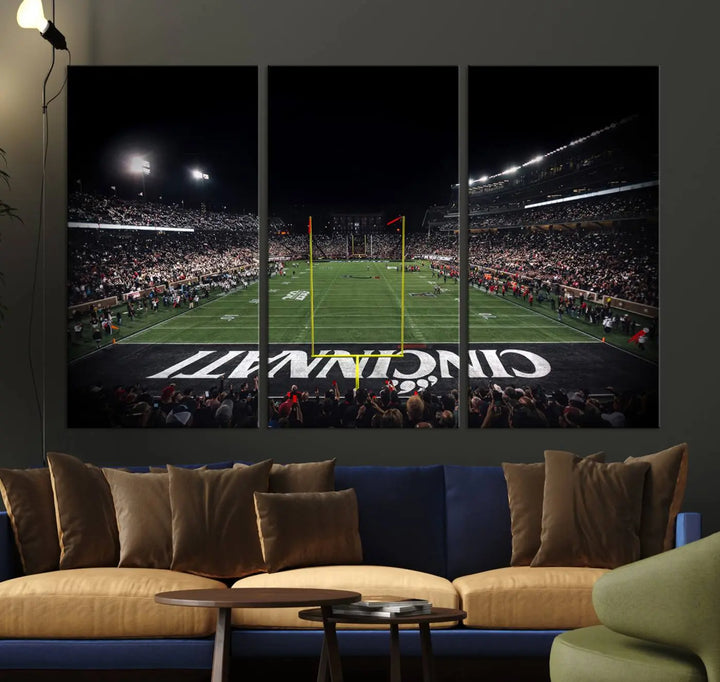 The Cincinnati Bearcats Football Team Print - Nippert Stadium Wall Art Canvas captures a panoramic view of the football stadium at night, offering museum-quality presentation. The vibrant colors and high-resolution printing bring every detail to life.