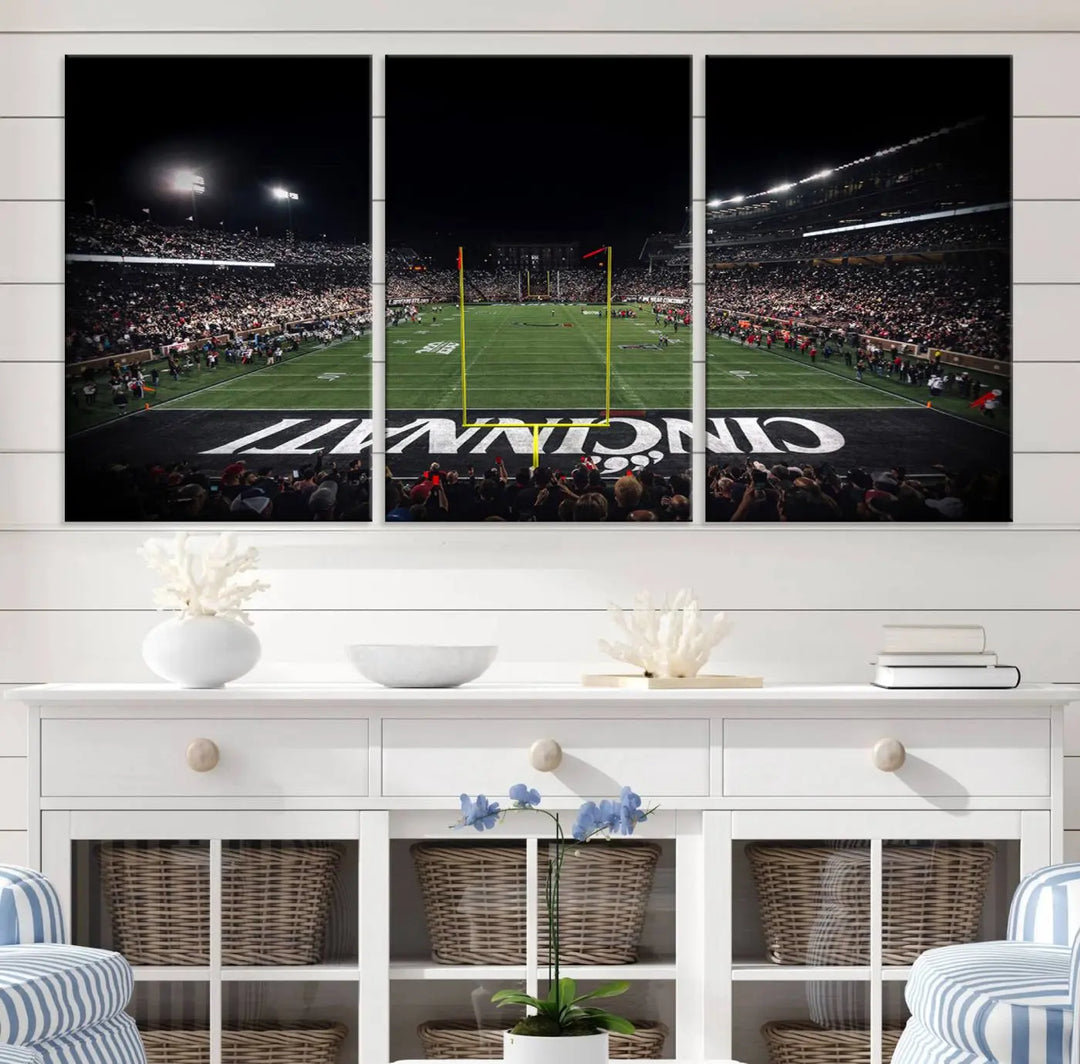 The Cincinnati Bearcats Football Team Print - Nippert Stadium Wall Art Canvas captures a panoramic view of the football stadium at night, offering museum-quality presentation. The vibrant colors and high-resolution printing bring every detail to life.