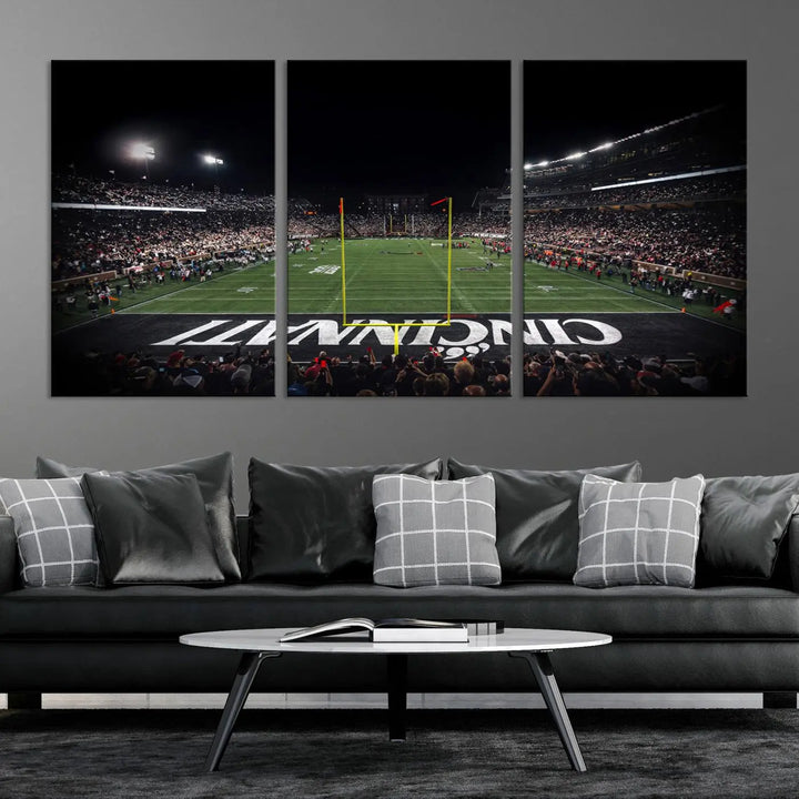 The Cincinnati Bearcats Football Team Print - Nippert Stadium Wall Art Canvas captures a panoramic view of the football stadium at night, offering museum-quality presentation. The vibrant colors and high-resolution printing bring every detail to life.