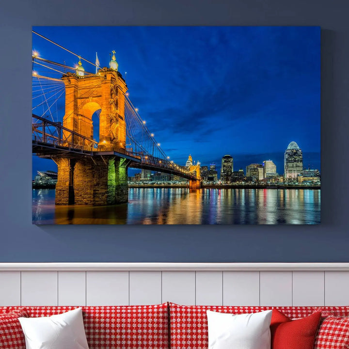 The living room features a museum-quality, multi-panel wall art titled "Cincinnati City Bridge Lights Night Skyline Cityscape View Wall Art Canvas Print," which depicts a lit-up bridge at night. The gallery-wrapped canvas adds a touch of elegance to the space.