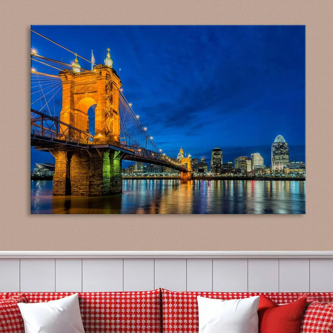 The living room features a museum-quality, multi-panel wall art titled "Cincinnati City Bridge Lights Night Skyline Cityscape View Wall Art Canvas Print," which depicts a lit-up bridge at night. The gallery-wrapped canvas adds a touch of elegance to the space.