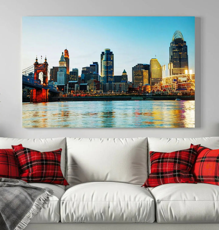 The "Cincinnati City Lights Bright Blue Skyline Cityscape View Wall Art Canvas Print" is a stunning triptych crafted on museum-quality canvas with a UV-protective coating to maintain its vivid colors. Ready to hang, it effortlessly elevates any space with its timeless allure.