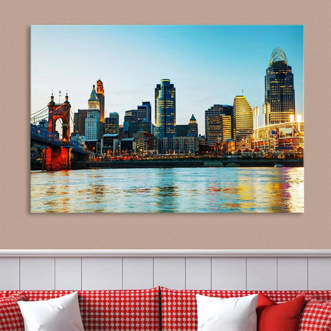 The "Cincinnati City Lights Bright Blue Skyline Cityscape View Wall Art Canvas Print" is a stunning triptych crafted on museum-quality canvas with a UV-protective coating to maintain its vivid colors. Ready to hang, it effortlessly elevates any space with its timeless allure.