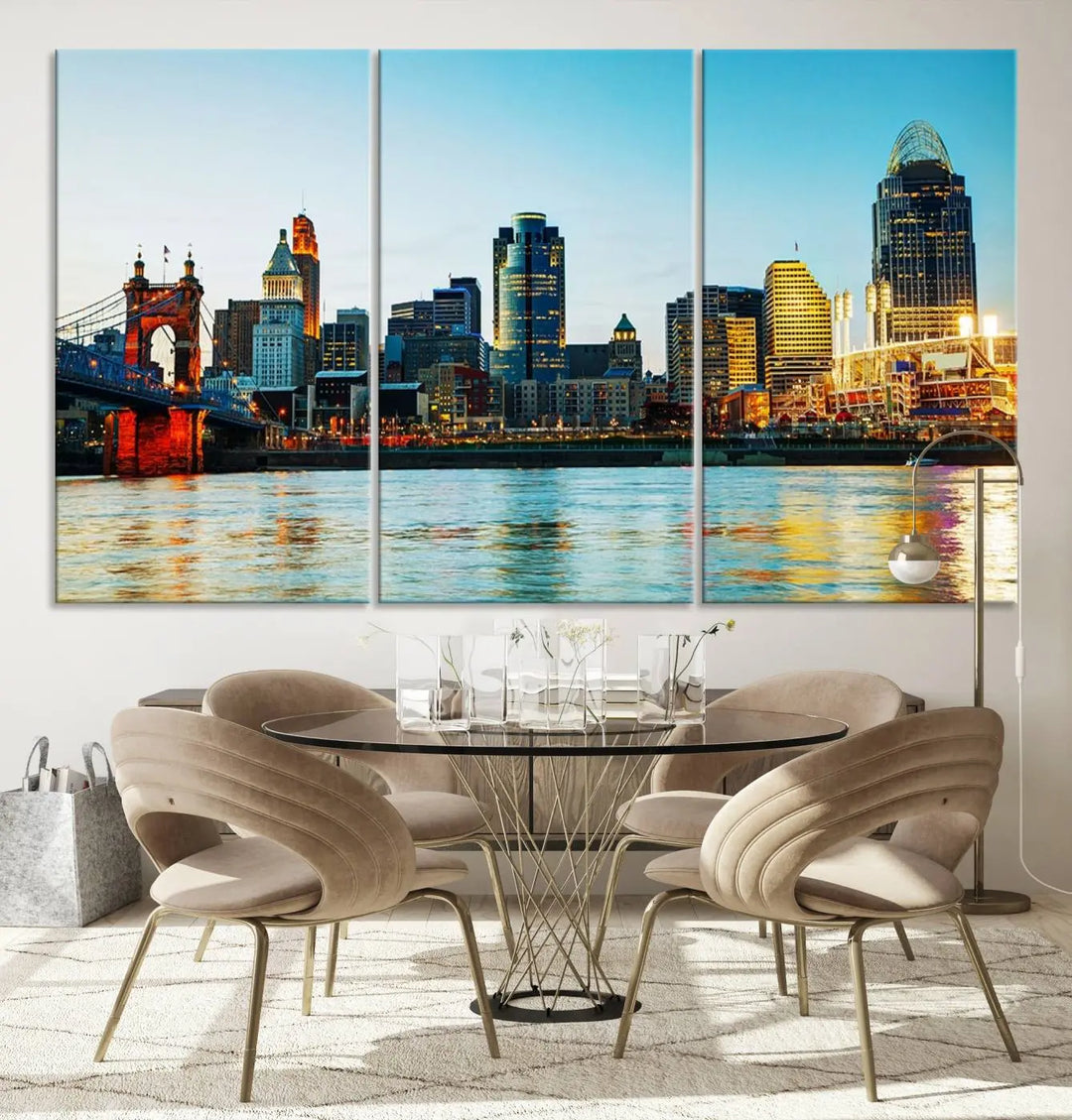 The "Cincinnati City Lights Bright Blue Skyline Cityscape View Wall Art Canvas Print" is a stunning triptych crafted on museum-quality canvas with a UV-protective coating to maintain its vivid colors. Ready to hang, it effortlessly elevates any space with its timeless allure.