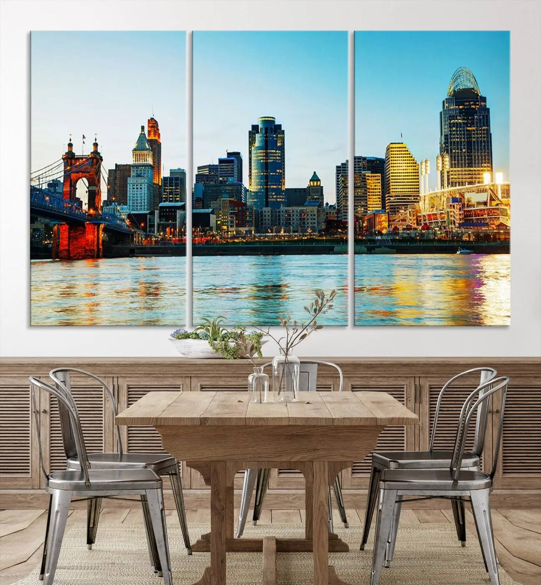 The "Cincinnati City Lights Bright Blue Skyline Cityscape View Wall Art Canvas Print" is a stunning triptych crafted on museum-quality canvas with a UV-protective coating to maintain its vivid colors. Ready to hang, it effortlessly elevates any space with its timeless allure.