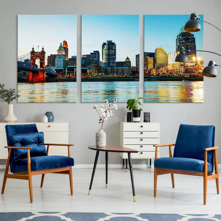 The "Cincinnati City Lights Bright Blue Skyline Cityscape View Wall Art Canvas Print" is a stunning triptych crafted on museum-quality canvas with a UV-protective coating to maintain its vivid colors. Ready to hang, it effortlessly elevates any space with its timeless allure.