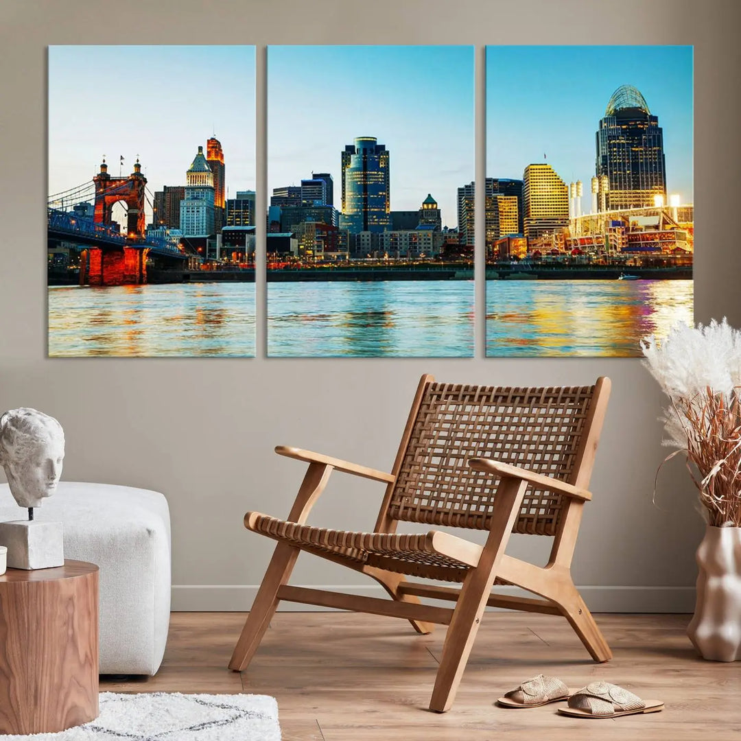 The "Cincinnati City Lights Bright Blue Skyline Cityscape View Wall Art Canvas Print" is a stunning triptych crafted on museum-quality canvas with a UV-protective coating to maintain its vivid colors. Ready to hang, it effortlessly elevates any space with its timeless allure.