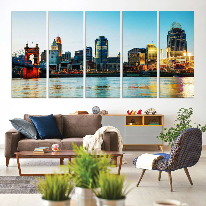 The "Cincinnati City Lights Bright Blue Skyline Cityscape View Wall Art Canvas Print" is a stunning triptych crafted on museum-quality canvas with a UV-protective coating to maintain its vivid colors. Ready to hang, it effortlessly elevates any space with its timeless allure.