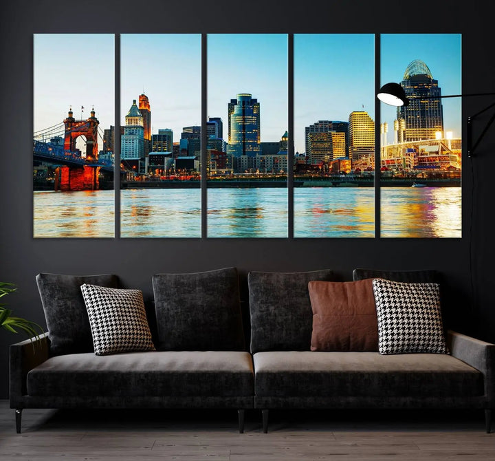 The "Cincinnati City Lights Bright Blue Skyline Cityscape View Wall Art Canvas Print" is a stunning triptych crafted on museum-quality canvas with a UV-protective coating to maintain its vivid colors. Ready to hang, it effortlessly elevates any space with its timeless allure.