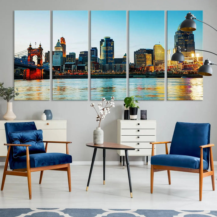 The "Cincinnati City Lights Bright Blue Skyline Cityscape View Wall Art Canvas Print" is a stunning triptych crafted on museum-quality canvas with a UV-protective coating to maintain its vivid colors. Ready to hang, it effortlessly elevates any space with its timeless allure.