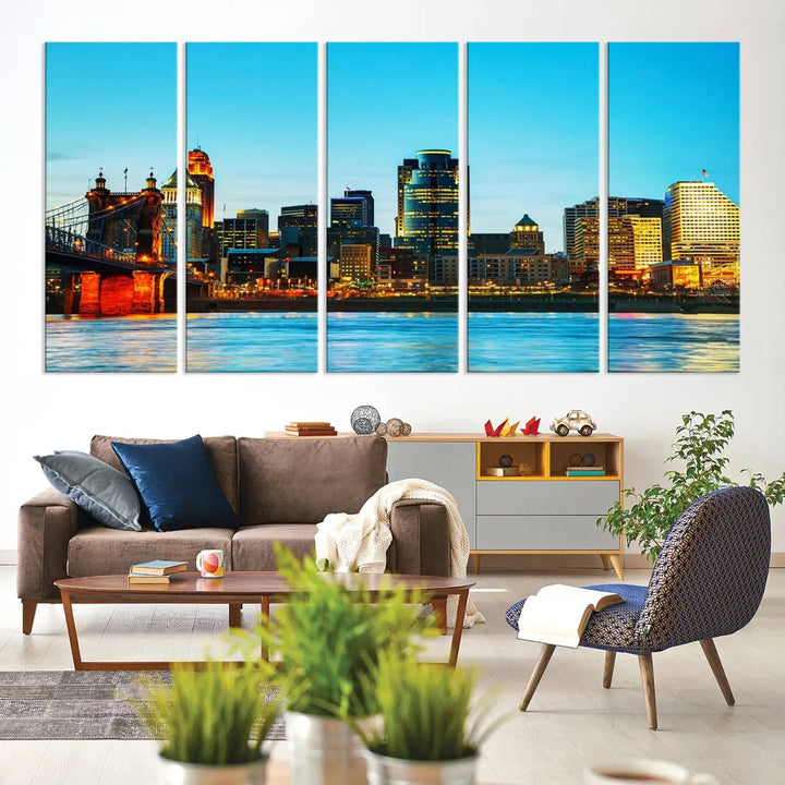 The "Cincinnati City Lights Bright Blue Skyline Cityscape View Wall Art Canvas Print" is displayed as a three-panel masterpiece. Expertly crafted on museum-quality polycotton canvas with a UV-protective coating, this artwork captures the essence of the city at dusk.