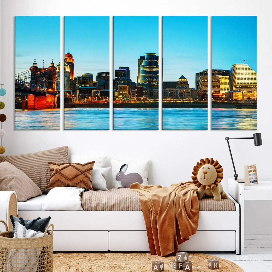 The "Cincinnati City Lights Bright Blue Skyline Cityscape View Wall Art Canvas Print" is displayed as a three-panel masterpiece. Expertly crafted on museum-quality polycotton canvas with a UV-protective coating, this artwork captures the essence of the city at dusk.