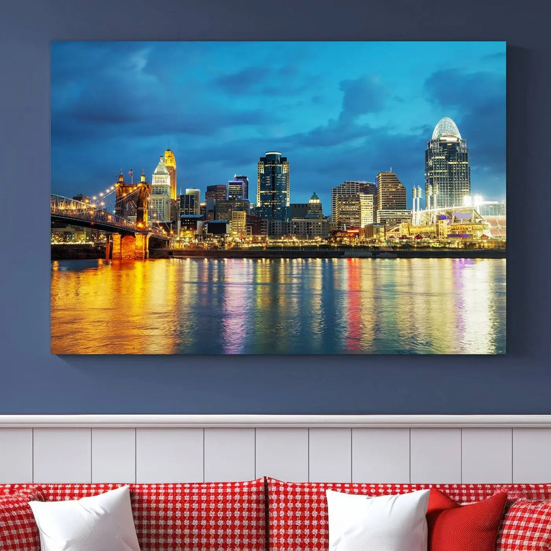 Displayed on a museum-quality canvas, the "Cincinnati City Lights Night Blue Skyline Cityscape View Wall Art Canvas Print" captures the city skyline's reflection in water at night.