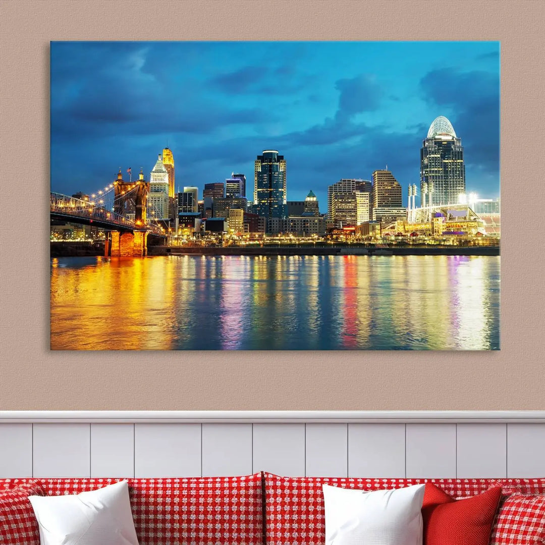 Displayed on a museum-quality canvas, the "Cincinnati City Lights Night Blue Skyline Cityscape View Wall Art Canvas Print" captures the city skyline's reflection in water at night.