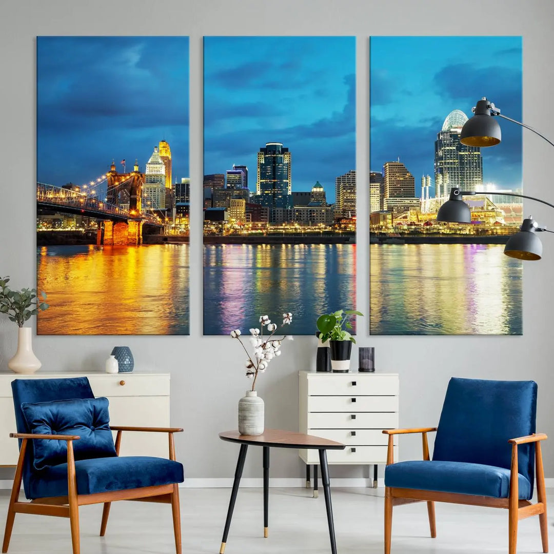 Displayed on a museum-quality canvas, the "Cincinnati City Lights Night Blue Skyline Cityscape View Wall Art Canvas Print" captures the city skyline's reflection in water at night.