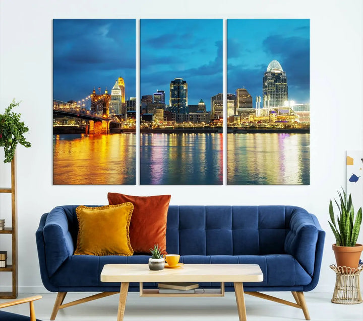 Displayed on a museum-quality canvas, the "Cincinnati City Lights Night Blue Skyline Cityscape View Wall Art Canvas Print" captures the city skyline's reflection in water at night.