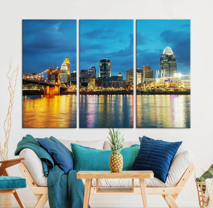 Displayed on a museum-quality canvas, the "Cincinnati City Lights Night Blue Skyline Cityscape View Wall Art Canvas Print" captures the city skyline's reflection in water at night.